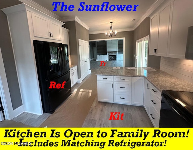 kitchen with white cabinetry, black appliances, light hardwood / wood-style flooring, and kitchen peninsula