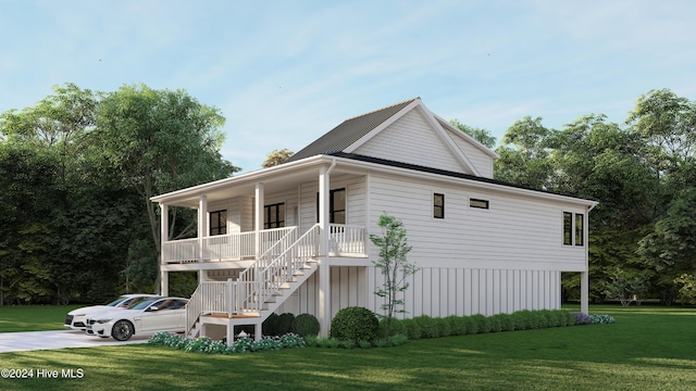 1550 Windsong Dr SW, Ocean Isle Beach, NC 28469 - view of side of property with stairway, a porch, and a lawn