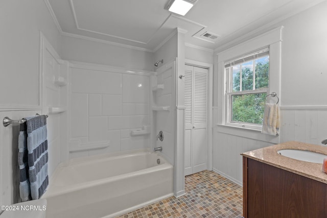 bathroom featuring shower / bathing tub combination, vanity, and ornamental molding