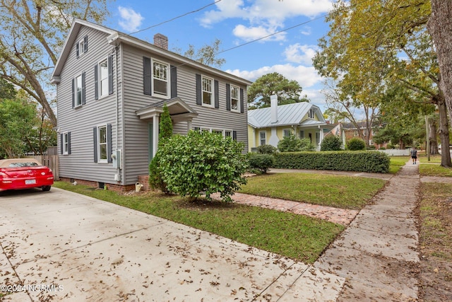 403 Ave D, New Bern, NC 28560 - view of front of property featuring concrete driveway and a chimney