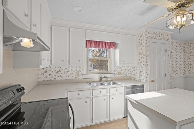 washroom featuring cabinets, washer hookup, a textured ceiling, crown molding, and electric panel