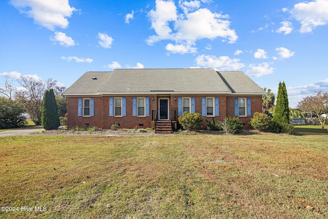 ranch-style home with a front yard