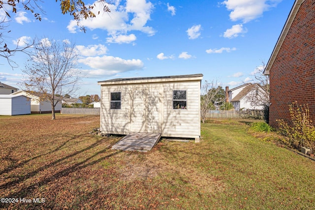 view of outdoor structure featuring a yard