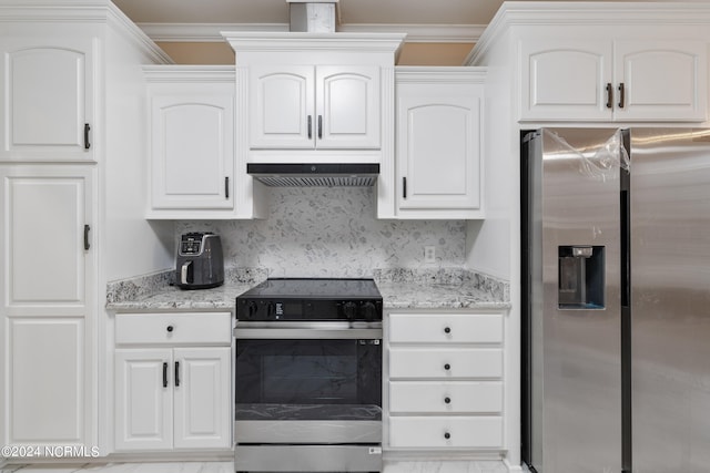 kitchen with range hood, ornamental molding, light stone countertops, white cabinetry, and appliances with stainless steel finishes