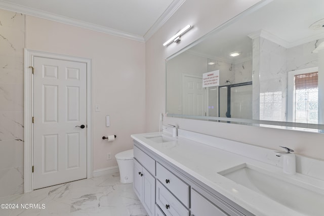 bathroom featuring vanity, toilet, crown molding, and an enclosed shower