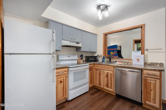 kitchen with white appliances, dark wood-type flooring, sink, and gray cabinets