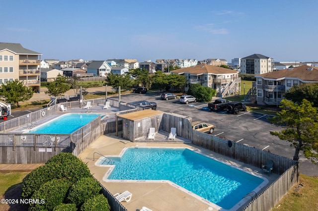 view of swimming pool featuring a patio