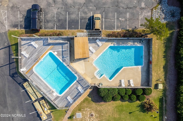 view of swimming pool featuring a patio