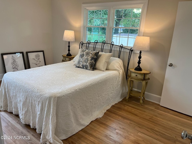 bedroom featuring light hardwood / wood-style floors