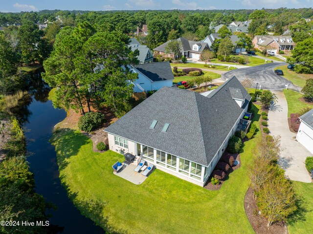 bird's eye view with a residential view and a water view