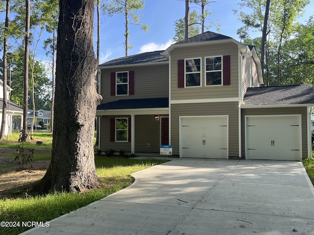 front of property featuring a garage