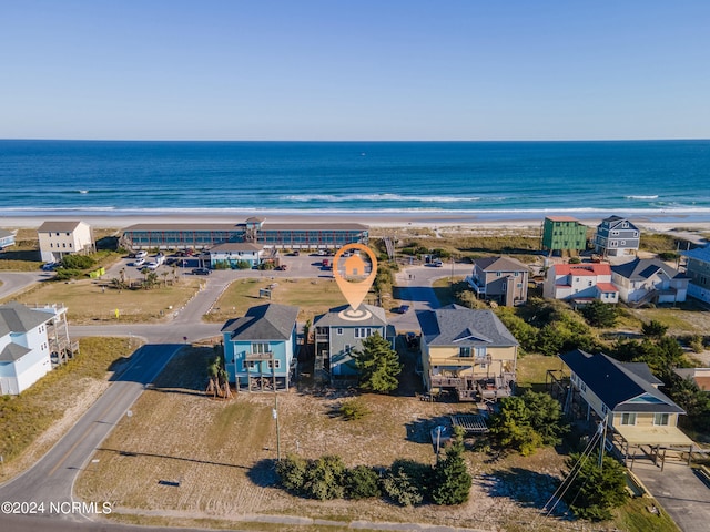 aerial view featuring a water view and a beach view