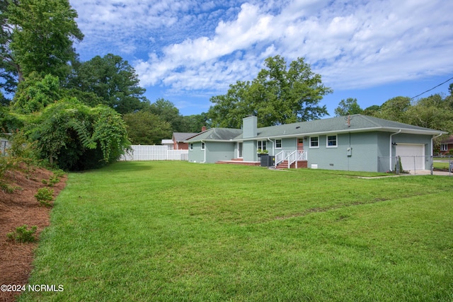 view of yard featuring a garage