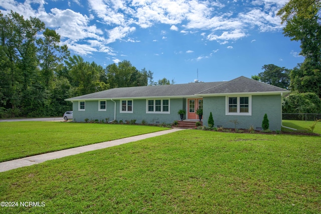 single story home with a front lawn