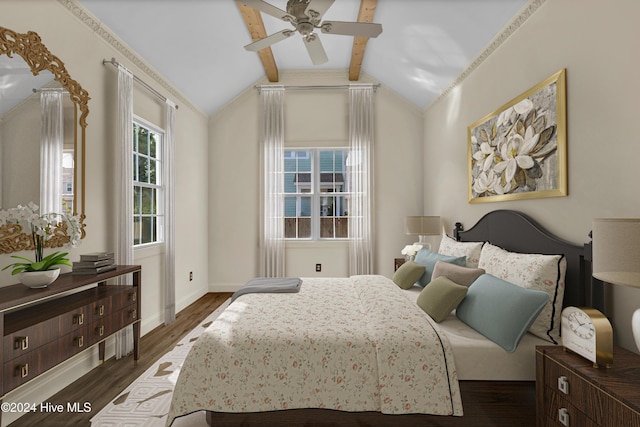 bedroom featuring dark hardwood / wood-style flooring, lofted ceiling with beams, and ceiling fan