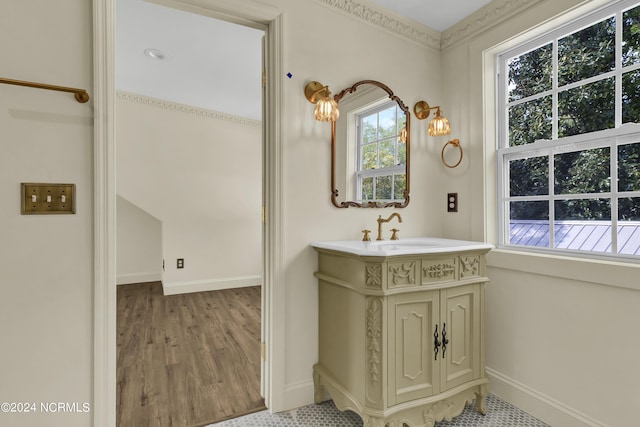 bathroom featuring vanity and hardwood / wood-style flooring