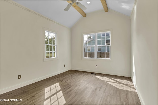 empty room with hardwood / wood-style flooring, vaulted ceiling with beams, and ceiling fan