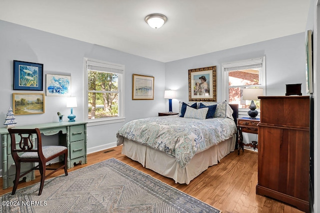 bedroom featuring light wood-type flooring