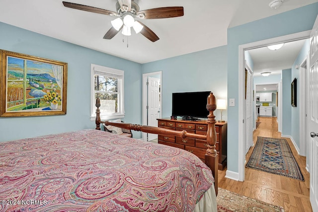 bedroom featuring light hardwood / wood-style floors and ceiling fan