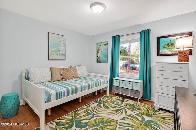 bedroom featuring hardwood / wood-style flooring