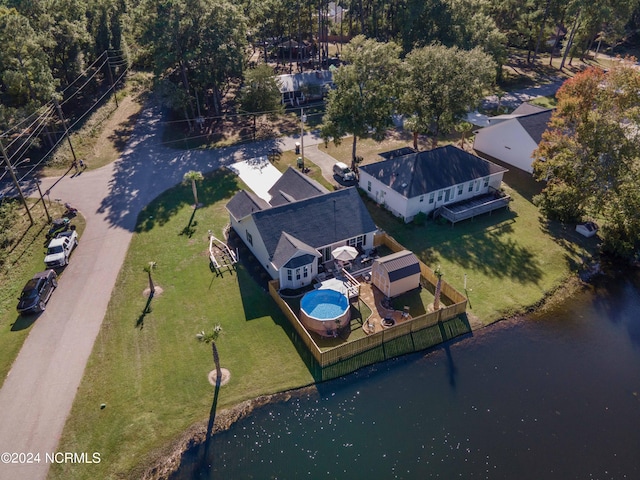 birds eye view of property featuring a water view