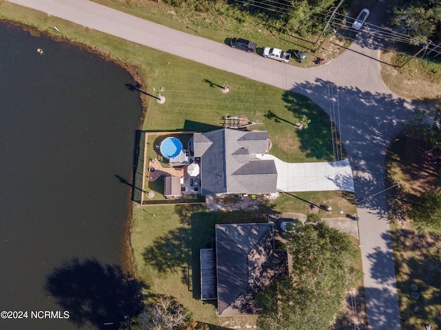 birds eye view of property featuring a water view