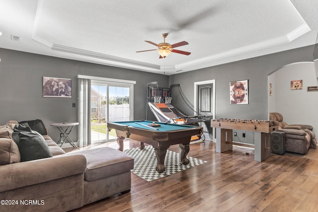 game room featuring hardwood / wood-style flooring, billiards, and a tray ceiling