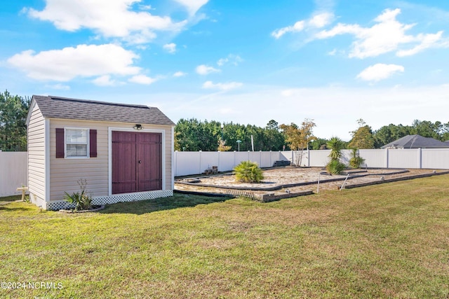 view of yard with a storage shed