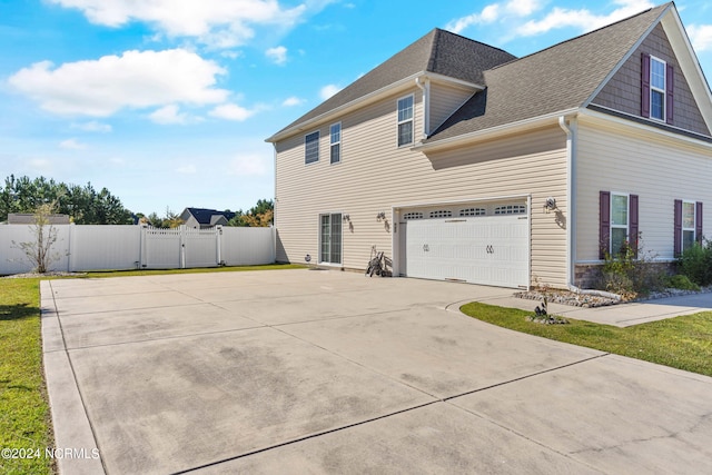 view of home's exterior featuring a garage