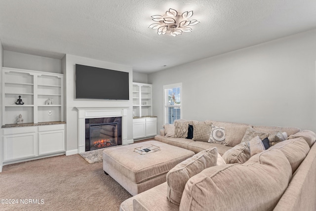 living room with light carpet, a textured ceiling, and a fireplace