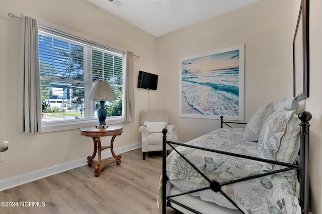 bedroom with light hardwood / wood-style flooring