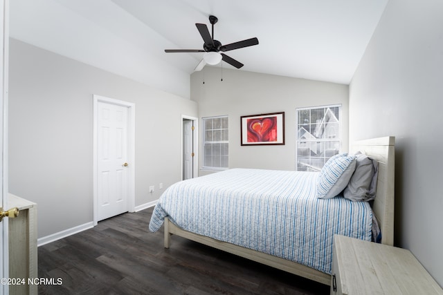 bedroom featuring ceiling fan, vaulted ceiling, and dark hardwood / wood-style floors