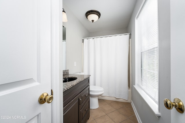 full bathroom featuring vanity, toilet, shower / tub combo, and tile patterned flooring