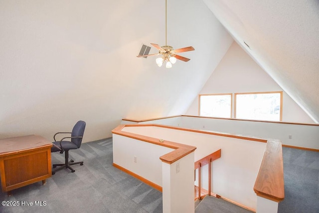 office area with carpet floors, ceiling fan, and vaulted ceiling