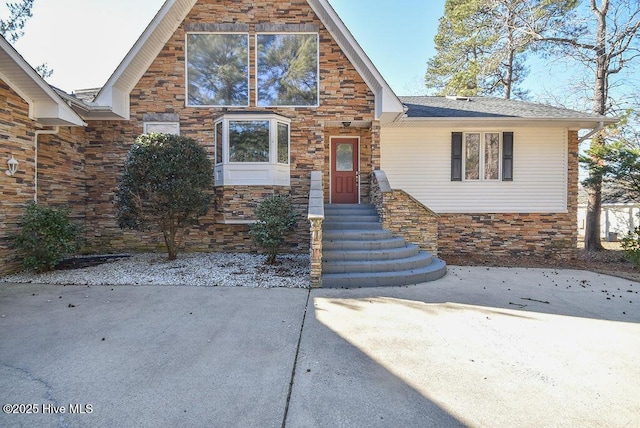 view of front of home with a patio area