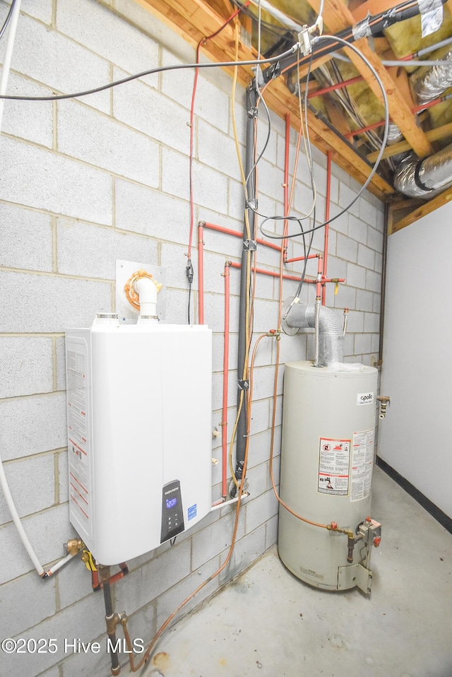 utility room featuring water heater and tankless water heater