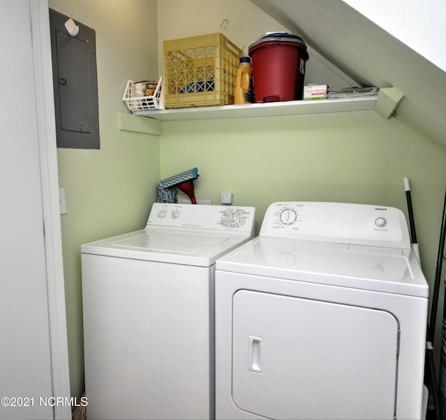 laundry area with washer and dryer and electric panel