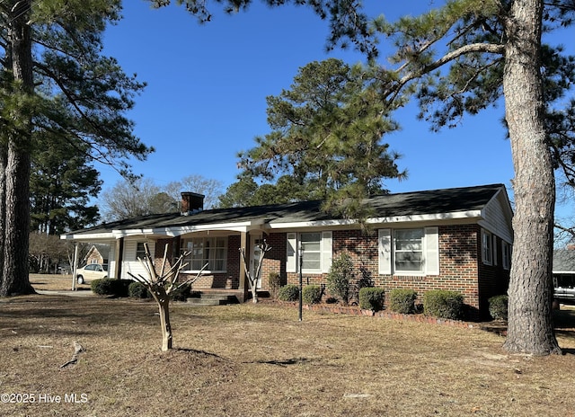 single story home featuring a porch