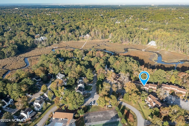 aerial view featuring a forest view