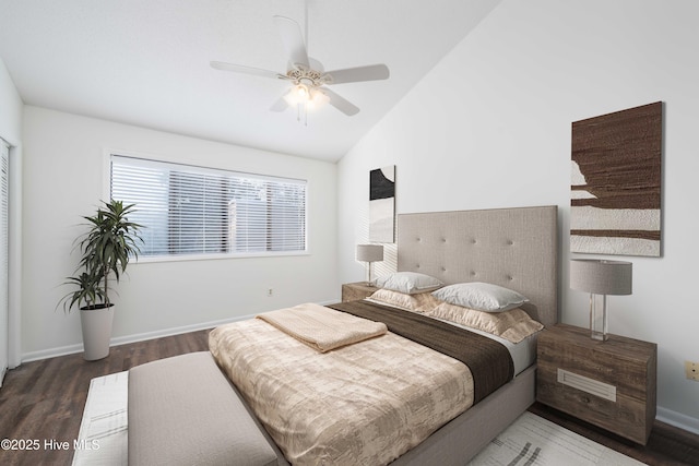 bedroom featuring lofted ceiling, baseboards, a ceiling fan, and wood finished floors
