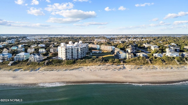 aerial view featuring a water view and a beach view