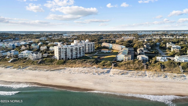 aerial view with a view of the beach and a water view