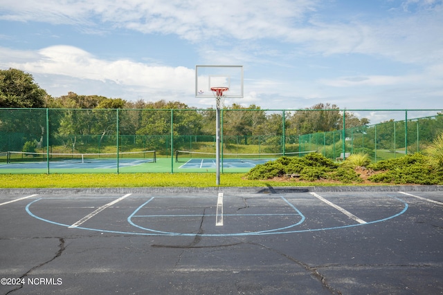 view of sport court with tennis court