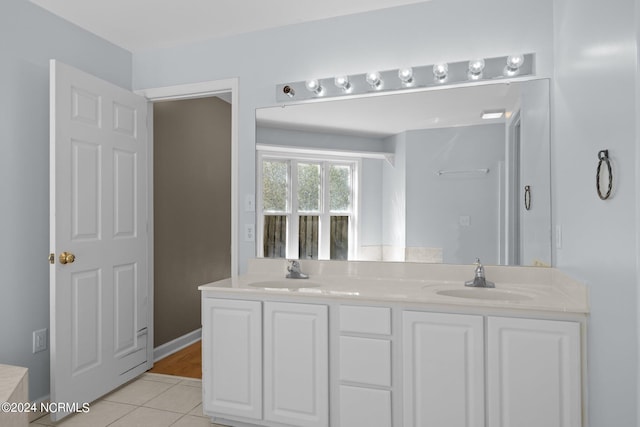 bathroom with vanity and tile patterned floors