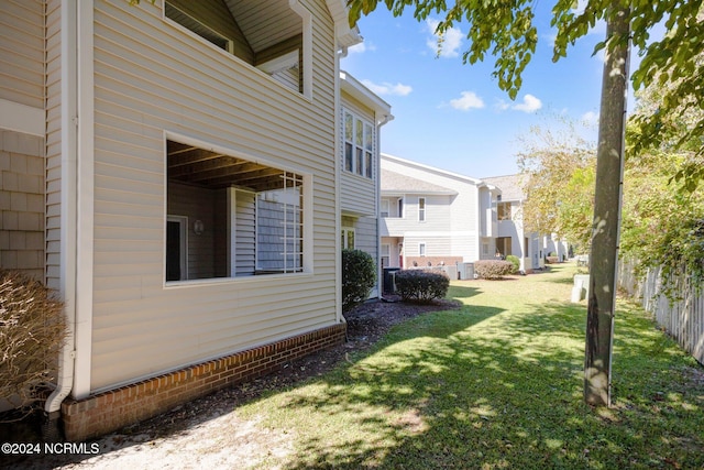 view of yard featuring central AC unit