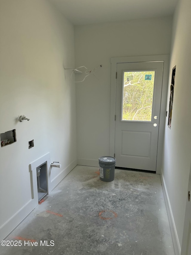 laundry area with baseboards, laundry area, and hookup for a washing machine