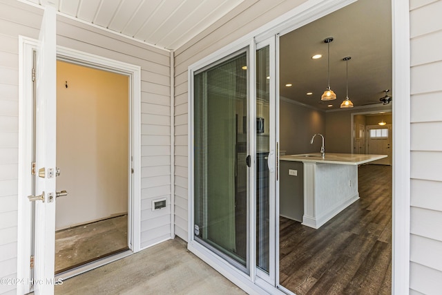 doorway to property featuring sink