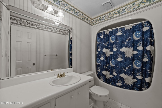 full bathroom with a textured ceiling, shower / bath combo with shower curtain, toilet, vanity, and tile patterned floors