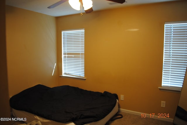 bedroom with carpet flooring and ceiling fan