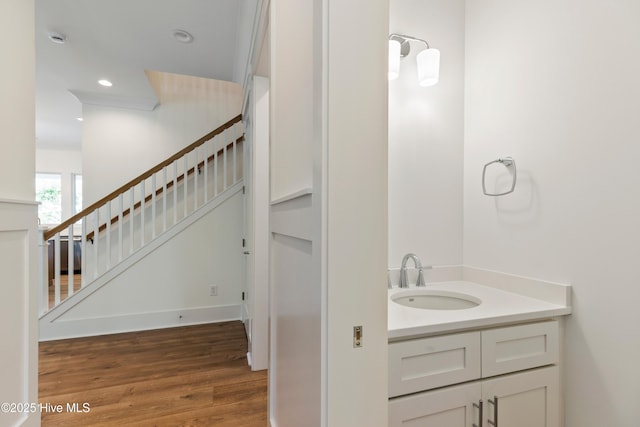 5312 Hanahan Dr, Wilmington, NC 28403 - bathroom featuring wood finished floors, vanity, and recessed lighting
